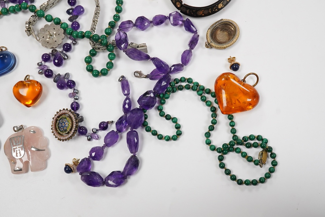 A 9ct and cabochon black onyx set pendant, on a 9ct chain, a 9ct and gem set ring and pair of 9ct and cultured pearl set ear clips, together with other items including costume jewellery, a silver bangle and a silver book